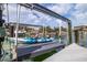 Waterfront home featuring a kayak lift that can accommodate up to two kayaks, and backyard water views at 137 11Th E St, Tierra Verde, FL 33715