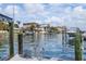 Waterfront home featuring beautiful water views and a well-kept boat dock with ladder access at 137 11Th E St, Tierra Verde, FL 33715