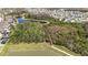 Community aerial view of a neighborhood featuring scenic walking trails and green spaces at 1435 Montgomery Bell Rd, Wesley Chapel, FL 33543