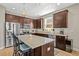 Stylish kitchen with a large island, stainless steel appliances, and granite countertops at 1435 Montgomery Bell Rd, Wesley Chapel, FL 33543