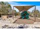 Community playground with shade structure, slides, and play area for children at 1435 Montgomery Bell Rd, Wesley Chapel, FL 33543