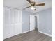 Inviting bedroom with a ceiling fan and large closet, perfect for relaxation at 1465 40Th Ne Ave, St Petersburg, FL 33703