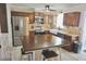 Well-appointed kitchen featuring stainless steel appliances, a large island, and bright lighting at 1509 Lemon St, Clearwater, FL 33756