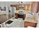 Modern kitchen with stainless steel appliances, butcher block countertops, and abundant cabinetry at 1509 Lemon St, Clearwater, FL 33756