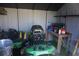 Organized shed interior with a lawnmower, shelving, and ample space for storage at 1509 Lemon St, Clearwater, FL 33756