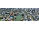Beautiful aerial shot of a home on the canal, showing its proximity to water and other waterfront properties at 15904 Redington Dr, Redington Beach, FL 33708