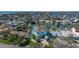 Aerial view of waterfront property in a neighborhood with private docks and boating access to the bay at 15904 Redington Dr, Redington Beach, FL 33708