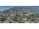 Wide aerial view displaying a neighborhood with easy access to both the bay and the beach at 15904 Redington Dr, Redington Beach, FL 33708