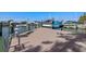 A boat dock is equipped with a lift for boat storage and provides access to waterfront activities at 15904 Redington Dr, Redington Beach, FL 33708