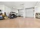 Bright, spacious garage with epoxy flooring, and ample room for vehicle storage at 15904 Redington Dr, Redington Beach, FL 33708