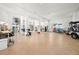 Spacious garage featuring epoxy flooring, ample storage, and a golf cart at 15904 Redington Dr, Redington Beach, FL 33708