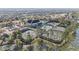 This property features picturesque tennis courts and a clubhouse amid lush greenery at 18823 Wimbledon Cir, Lutz, FL 33558