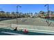 Several outdoor tennis courts offering ample space for players to enjoy a match at 18823 Wimbledon Cir, Lutz, FL 33558