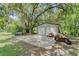 Property features a large two-door garage and plenty of room for parking at 2708 De Montmollin Rd, Plant City, FL 33565