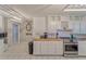 Cozy kitchen featuring stainless steel appliances, butcher block counters, and subway tile backsplash at 2708 De Montmollin Rd, Plant City, FL 33565