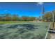 Outdoor basketball court with playground in background, providing recreational activities for residents at 3115 Bent Creek Dr, Valrico, FL 33596