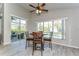 Bright dining room provides views of the pool and an outdoor seating area, creating an inviting atmosphere at 3115 Bent Creek Dr, Valrico, FL 33596