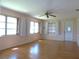 Spacious living room with abundant natural light and hardwood floors at 3472 100Th N Ter, Pinellas Park, FL 33782