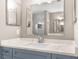 Bathroom vanity with white countertop and a chrome faucet at 3654 Beneraid St, Land O Lakes, FL 34638