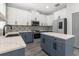 Modern kitchen with stainless appliances, an island, and ample cabinet space at 3654 Beneraid St, Land O Lakes, FL 34638