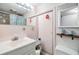 Compact bathroom with a single sink vanity and toilet at 36745 Kimela Ave, Zephyrhills, FL 33542