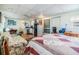 Cozy living area with bed and kitchenette at 36745 Kimela Ave, Zephyrhills, FL 33542