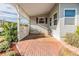 Charming patio area with brick flooring and decorative privacy lattice at 36745 Kimela Ave, Zephyrhills, FL 33542