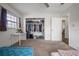 Cozy bedroom featuring large closet, window and neutral carpeting at 4112 Ashford Green Pl # I203, Tampa, FL 33613