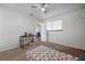 Bedroom with carpet flooring, window, and connecting doorway to a living space at 4112 Ashford Green Pl # I203, Tampa, FL 33613