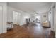 Well-lit living room featuring laminate flooring and a ceiling fan at 4112 Ashford Green Pl # I203, Tampa, FL 33613