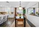Dining area boasts modern decor, with adjacent kitchen and neutral color palette at 4511 S Manhattan Ave # 32, Tampa, FL 33611