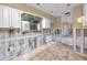 The kitchen area includes modern cabinets, a large window, and space for updated appliances at 479 80Th Way, St Pete Beach, FL 33706