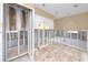 The kitchen area features white cabinets and an open layout to adjacent rooms at 479 80Th Way, St Pete Beach, FL 33706