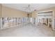 Spacious open living room with exposed framework and terrazzo floors ready to be renovated at 479 80Th Way, St Pete Beach, FL 33706