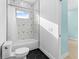 Bathroom features a black and white geometric tile surround on the bathtub at 4907 15Th N Ave, St Petersburg, FL 33710