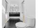 Bathroom with a toilet, hexagon tile floor and double sink vanity at 4907 15Th N Ave, St Petersburg, FL 33710