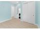 Light-filled bedroom with blue walls and double door closet at 4907 15Th N Ave, St Petersburg, FL 33710