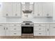 Modern kitchen featuring white cabinets, stainless steel appliances, and stylish hardware at 4907 15Th N Ave, St Petersburg, FL 33710