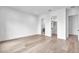 Spacious room with multiple entrances to a walk-in closet, a bathroom, and hardwood floors at 5017 W Dickens Ave, Tampa, FL 33629