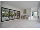 Spacious covered outdoor kitchen with stainless steel grill and ample counter space at 5017 W Dickens Ave, Tampa, FL 33629