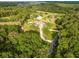 Lush residential neighborhood with mature trees and long driveways at 5546 Drexel Rd, Land O Lakes, FL 34638