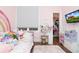 Bright bedroom with modern decor, featuring pastel colors and a cozy feel at 5546 Drexel Rd, Land O Lakes, FL 34638