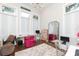 Bright bedroom featuring a work space with white cabinets and natural light at 5546 Drexel Rd, Land O Lakes, FL 34638