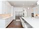 Bright, open kitchen with marble countertops, stainless steel appliances, and ample storage at 5546 Drexel Rd, Land O Lakes, FL 34638