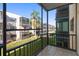 Relaxing balcony with views of lush green landscaping at 5969 Terrace Park N Dr # 203, St Petersburg, FL 33709