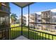 Screened balcony overlooking community green space at 5969 Terrace Park N Dr # 203, St Petersburg, FL 33709