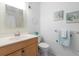 Updated bathroom with single vanity and designer accents at 5969 Terrace Park N Dr # 203, St Petersburg, FL 33709