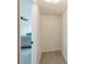 Small walk-in closet with overhead light and pull chain at 6321 La Brea St, North Port, FL 34287