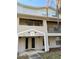 Inviting condo exterior with well-kept landscaping and classic architectural details at 7138 E Bank Dr # 7138, Tampa, FL 33617