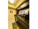 Modern kitchen showcasing sleek countertops, dark cabinetry, and an open layout to the living space at 7138 E Bank Dr # 7138, Tampa, FL 33617